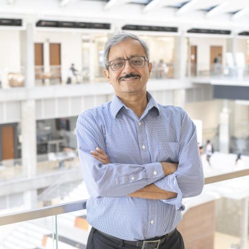 Man with arms crossed.