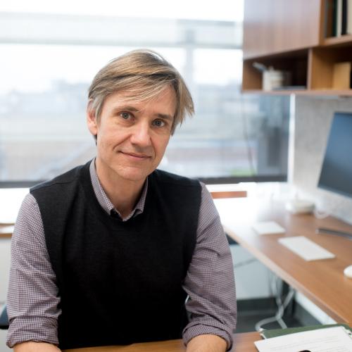 Man sitting at desk.