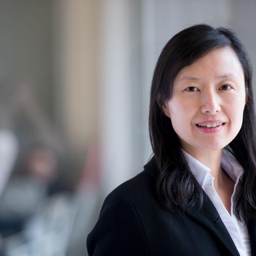 Woman smiling at camera.