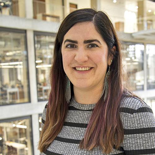 Woman smiling at camera.