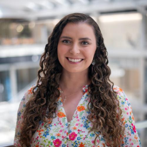 Woman smiling at camera.